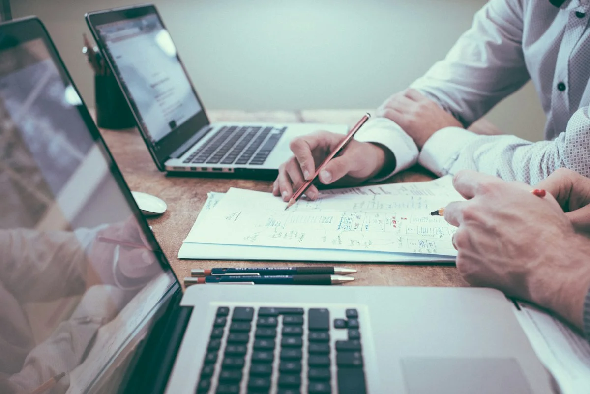 Legal team analyzing workflows and software integration with SISNOT in modern notary office